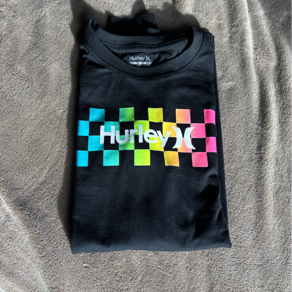 New without tags, never worn boys long sleeve Hurley tee shirt.